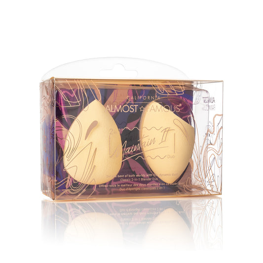 Two gold makeup sponges in a decorative box with 'Almost Famous' branding.