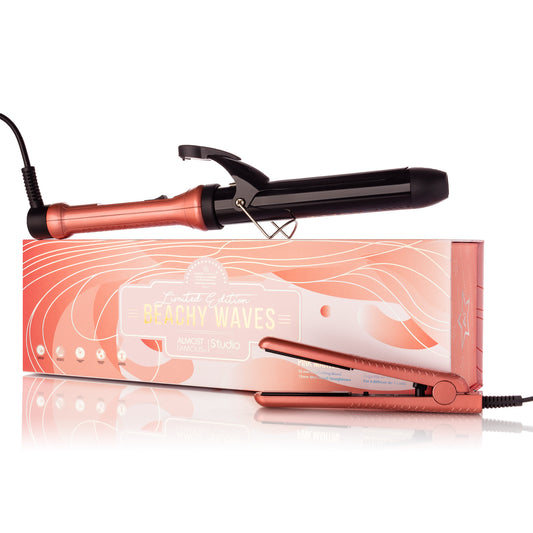 Rose gold hair straightener with packaging on a white background