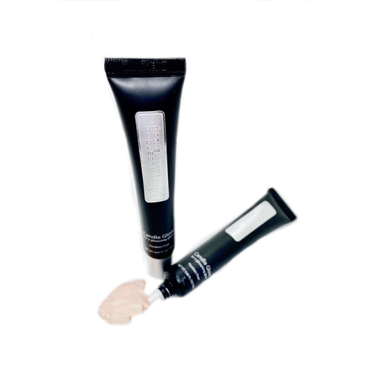 Two black cosmetic tubes with white labels on a white background