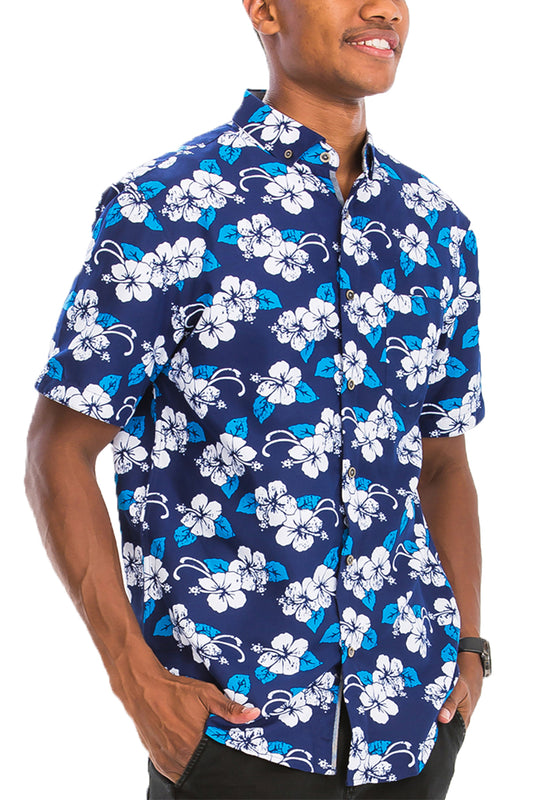 Man wearing a navy blue shirt with white and blue floral pattern on a white background