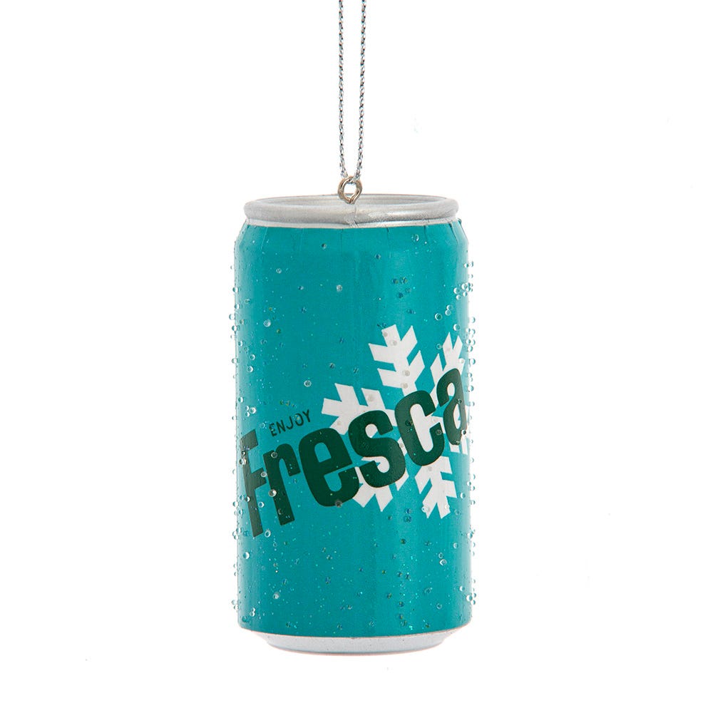 Teal Fresca soda can ornament with snowflake design on a white background