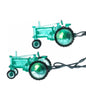 String lights shaped like tractors on a white background