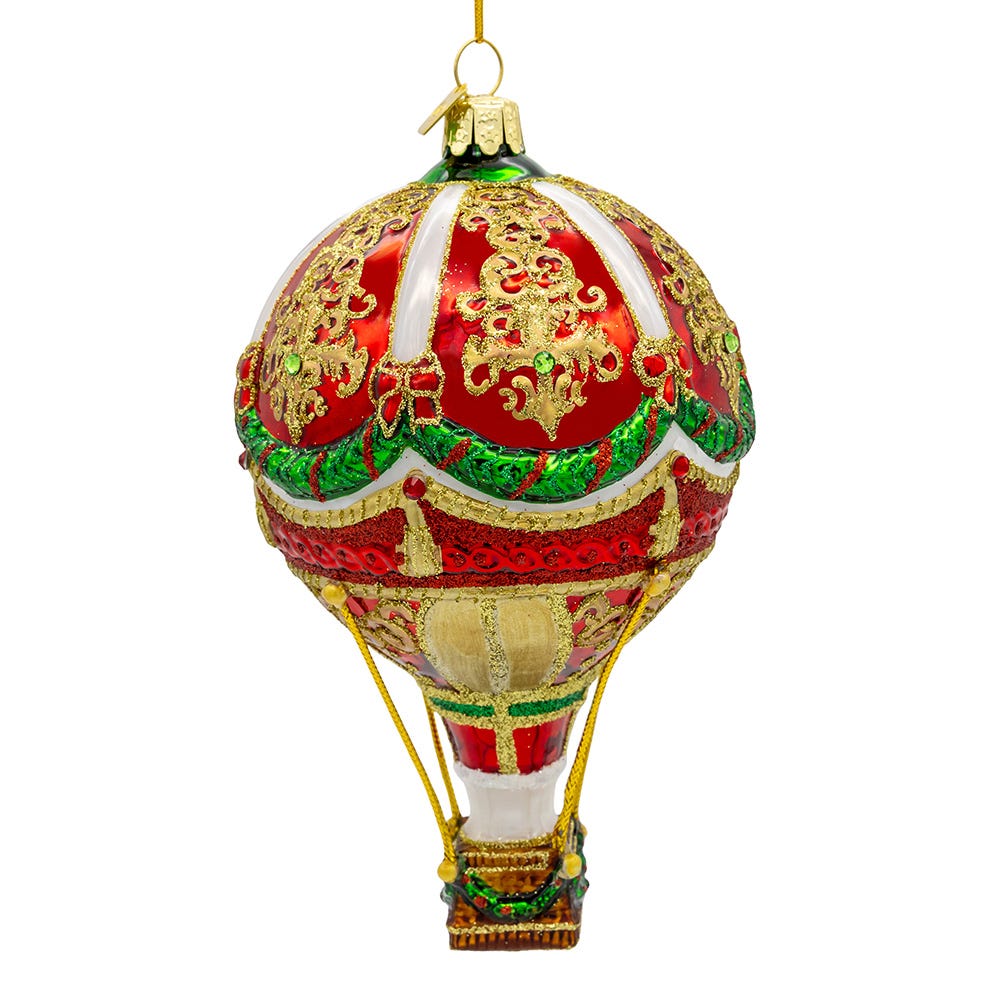 Decorative hot air balloon ornament with red, gold, and green colors on a white background