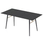 A black ceramic tile top dining table with a metal frame and gold-colored accents on the legs, designed for small spaces.