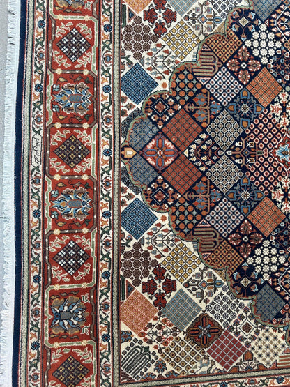 Hand-Knotted Indo-Joshegan Wool Rug – 12'2" x 9'1" – Geometric Medallion Design, Rich Warm Palette