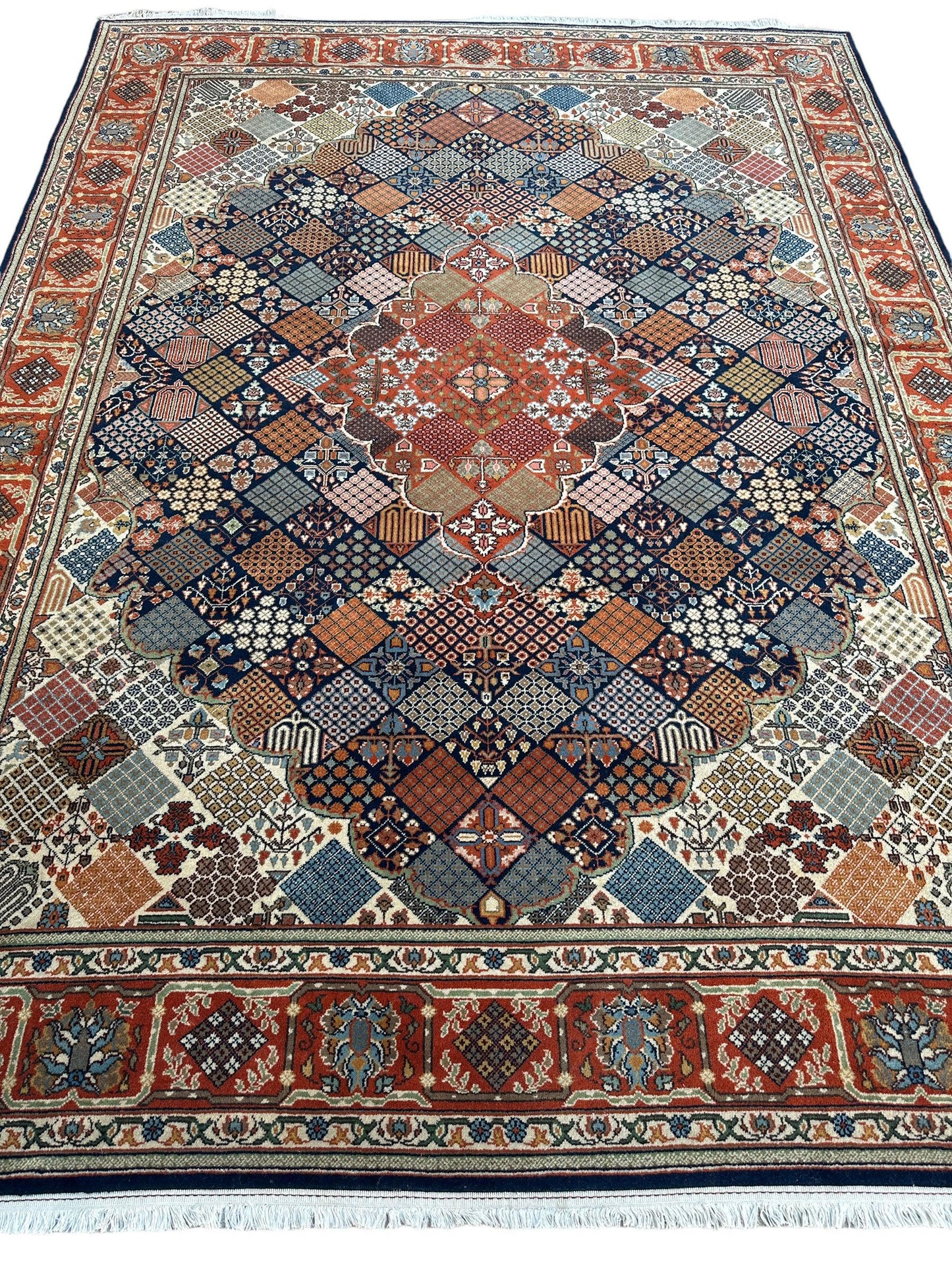 Hand-Knotted Indo-Joshegan Wool Rug – 12'2" x 9'1" – Geometric Medallion Design, Rich Warm Palette