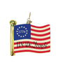 Decorative ornament with American flag design featuring '1776' and 'We The People'.