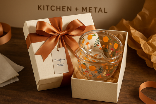 Gift-wrapped glass bowls with Kitchen + Metal branding