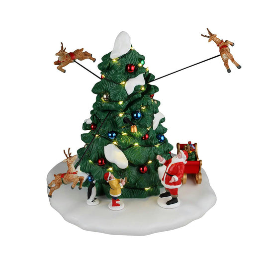 Decorative Christmas scene with a tree, Santa Claus, and reindeer on a white background