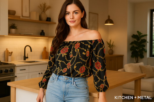 Homeowner wearing chain and rose pattern off-shoulder top in modern home setting
