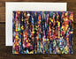 Colorful abstract art card on a wooden surface