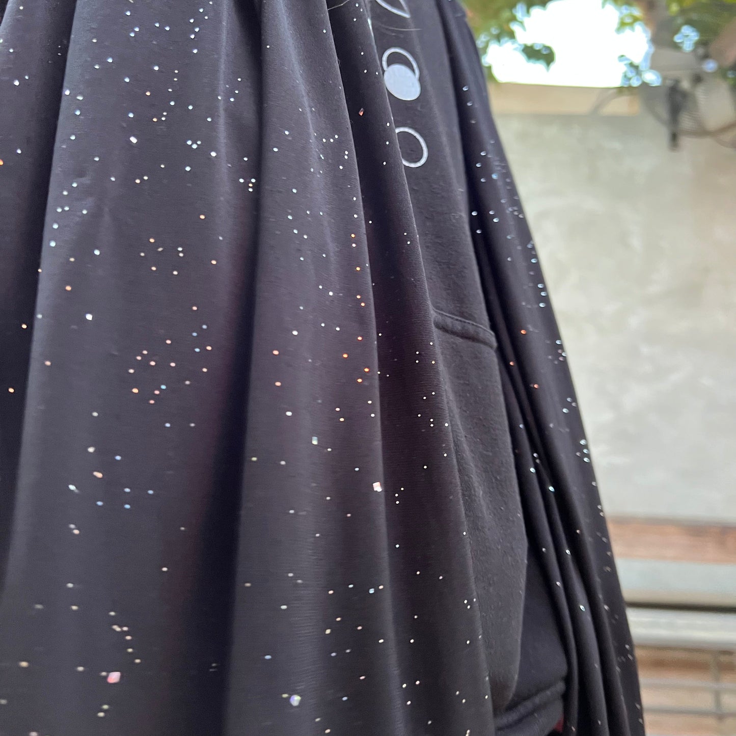 Dark fabric with star pattern in an outdoor setting