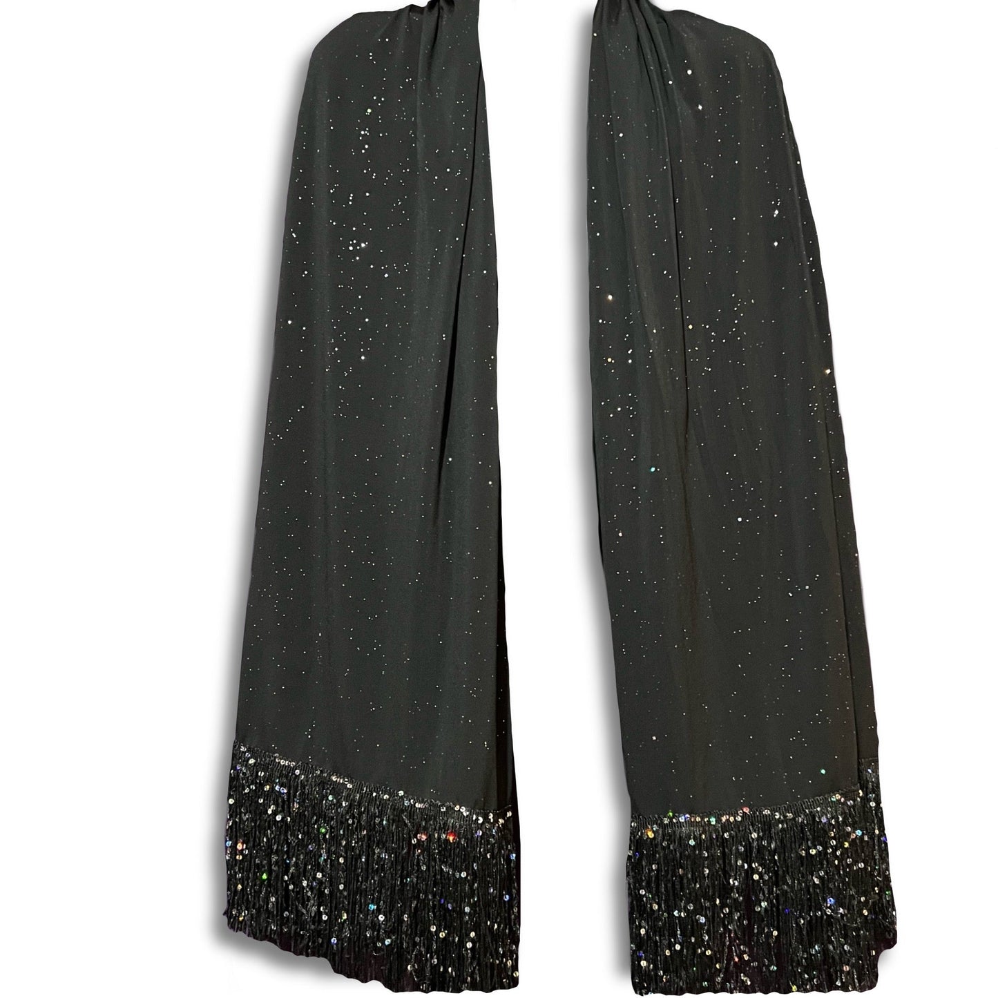 Black scarf with glittery fringe on a white background