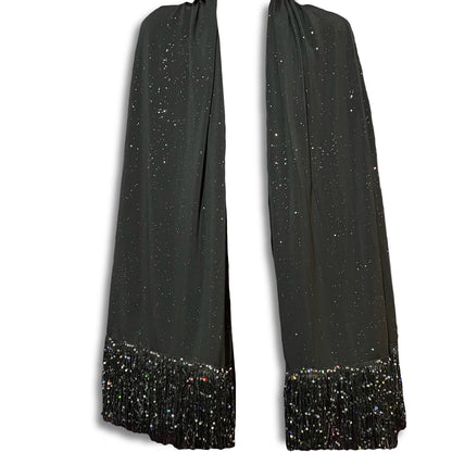 Black scarf with glittery fringe on a white background