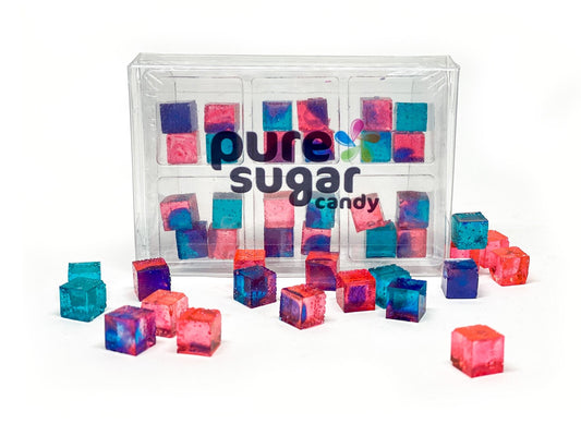 A clear plastic box containing red, blue, and pink candy cubes with the brand 'Pure Sugar Candy' visible on the front.