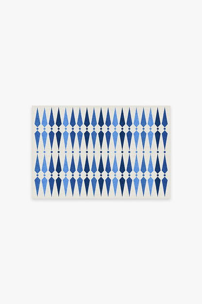 Rectangular placemat with blue geometric pattern on a white background
