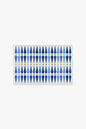 Rectangular placemat with blue geometric pattern on a white background