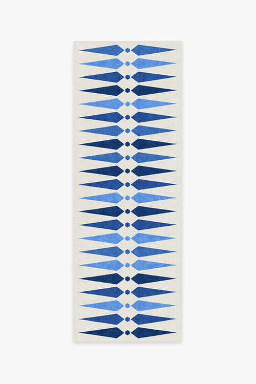 Yoga mat with blue geometric pattern on a white background