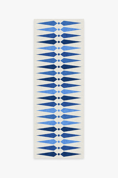 Yoga mat with blue geometric pattern on a white background