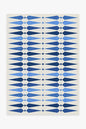 Rug with blue geometric pattern on a white background