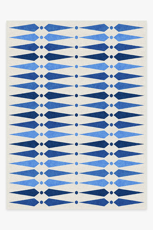 Rug with blue and white geometric pattern
