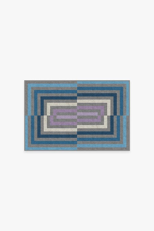 Rectangular rug with geometric pattern on a white background