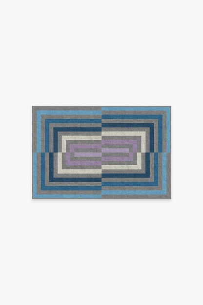 Rectangular rug with geometric pattern on a white background