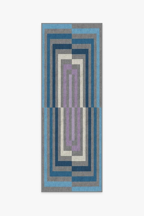 Rectangular area rug with geometric pattern on a white background
