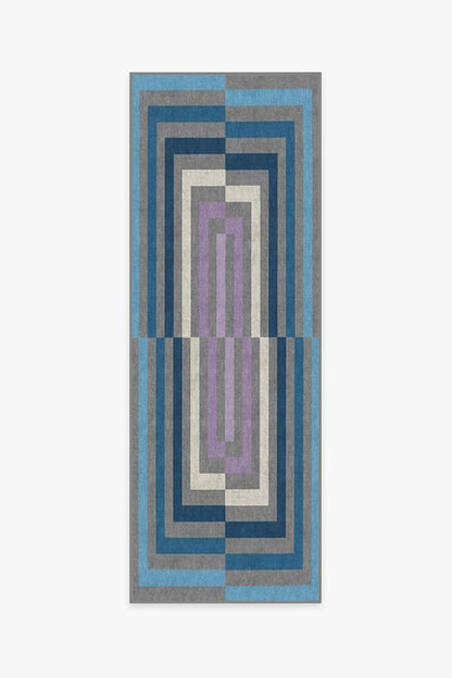 Rectangular area rug with geometric pattern on a white background