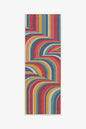 Colorful wavy patterned mat on a white background