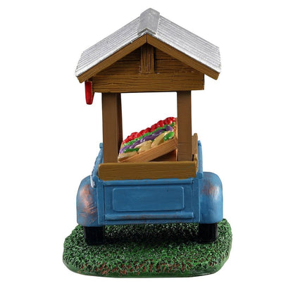 Model of a blue truck with a wooden stand selling sandwiches on a white background