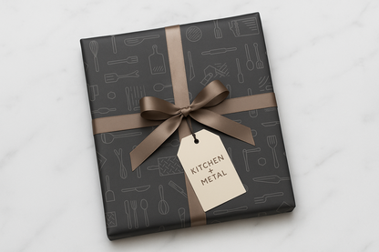 Gift box with 'Kitchen Metal' tag on a light gray background