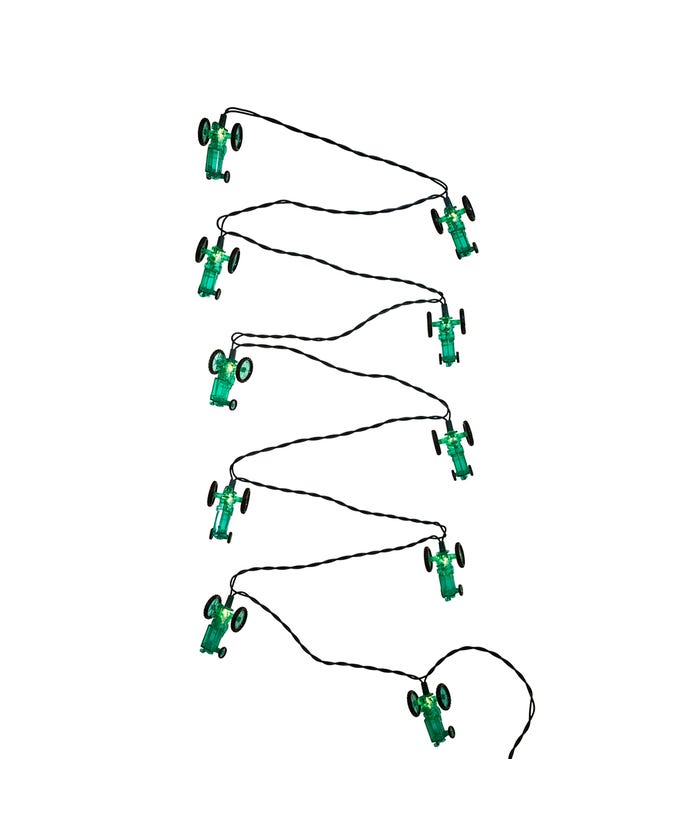 Set of green toy cars on strings arranged in a circular pattern on a white background