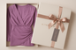 Lavender wrap dress gift wrapped with Kitchen + Metal branding