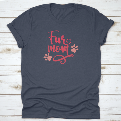 Navy blue t-shirt with 'Fur Mom' text and paw prints on a wooden surface