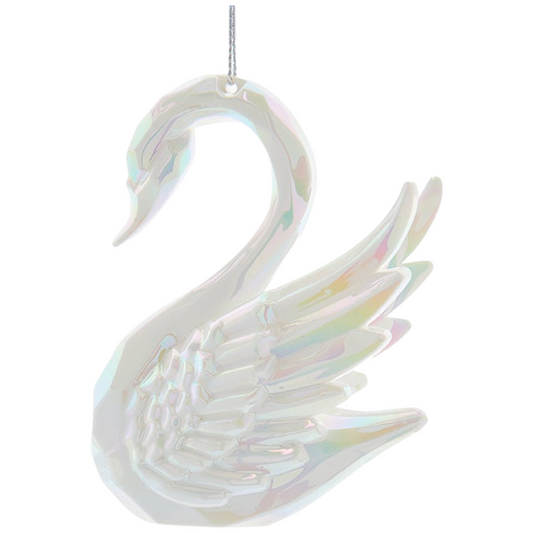 Iridescent swan-shaped ornament on a white background