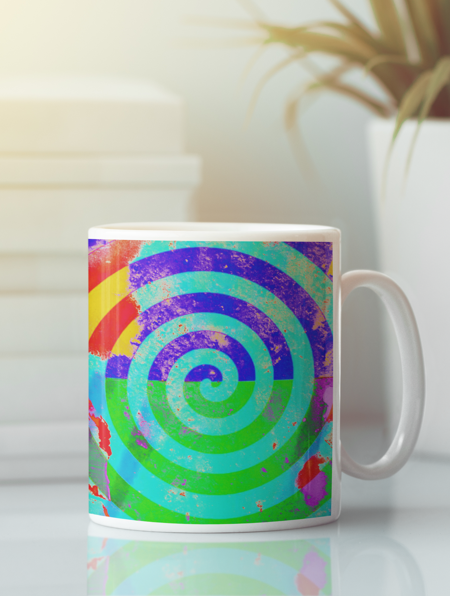 Mug with a colorful spiral design on a white background
