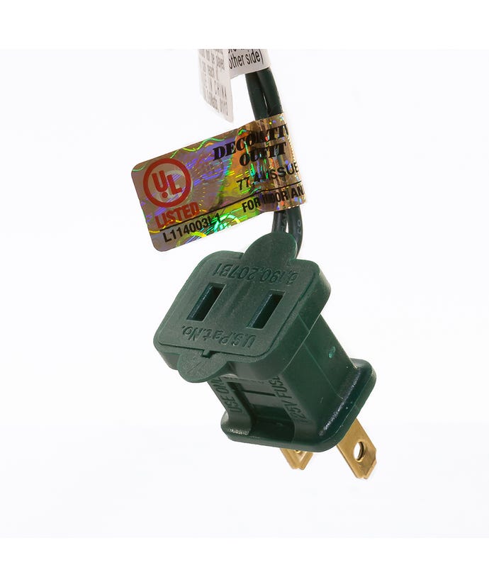 Green electrical plug with UL listing label on a white background