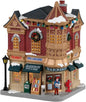 Model of a five-and-dime store with a person and festive decorations on a white background