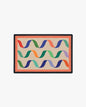 Rectangular mat with colorful wavy pattern on a beige background