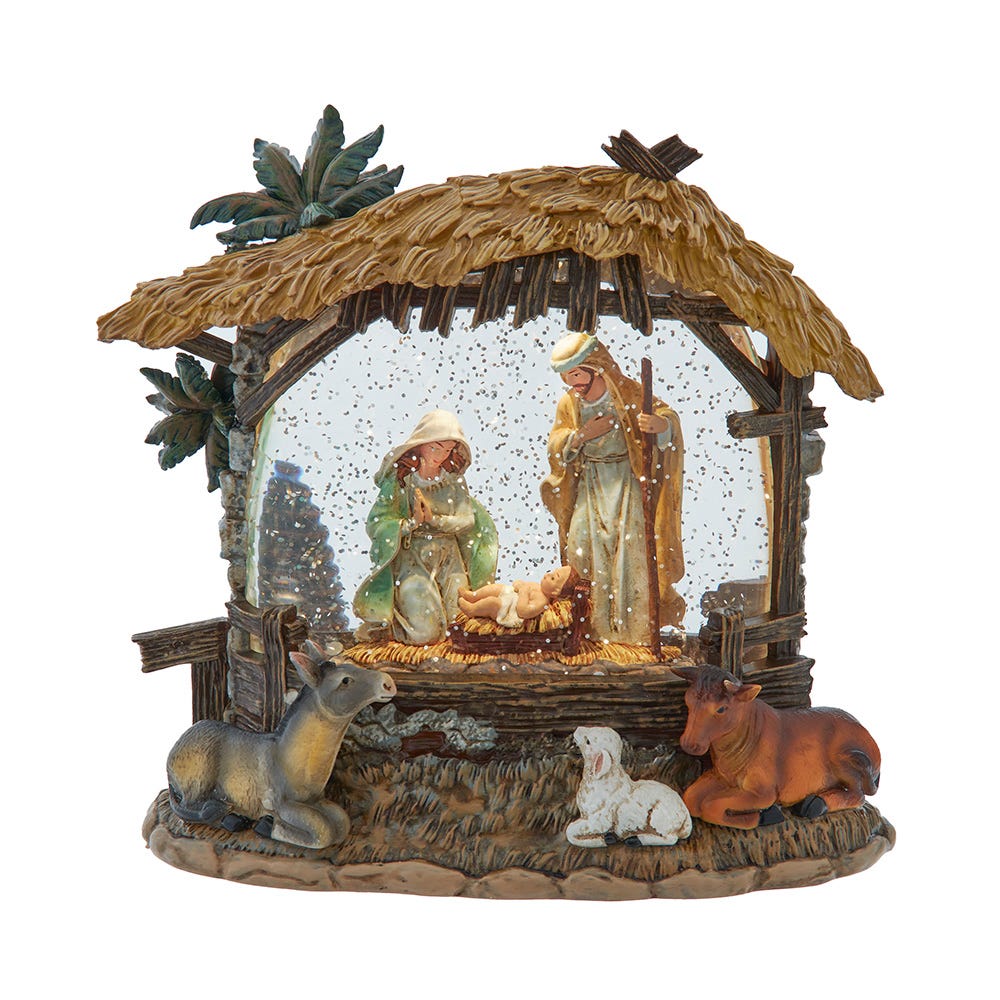 Decorative nativity scene with figures and animals in a thatched-roof stable.