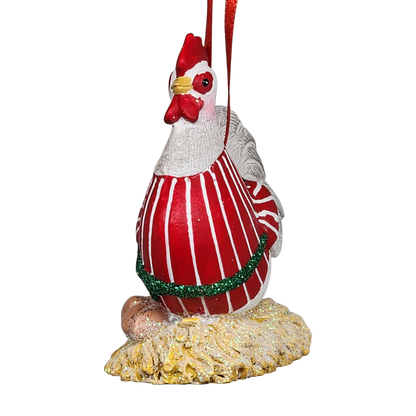 Decorative rooster ornament with red and white striped body on a white background