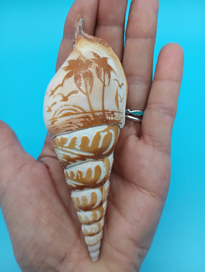 Carved Tibia Shell with Palm Tree Scene – 4.4"