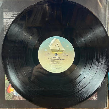 In The Eye Of The Storm (VINYL) | Near Mint- (NM-) Excellent+ (EX+)