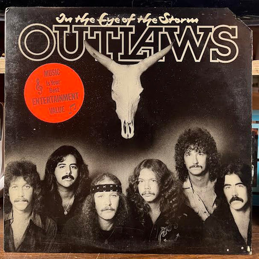 In The Eye Of The Storm (VINYL) | Near Mint- (NM-) Excellent+ (EX+)