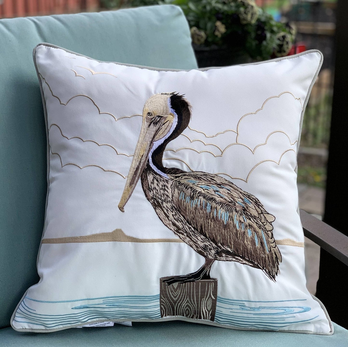 Sunbathing Brown Pelican Indoor/Outdoor Throw Pillow