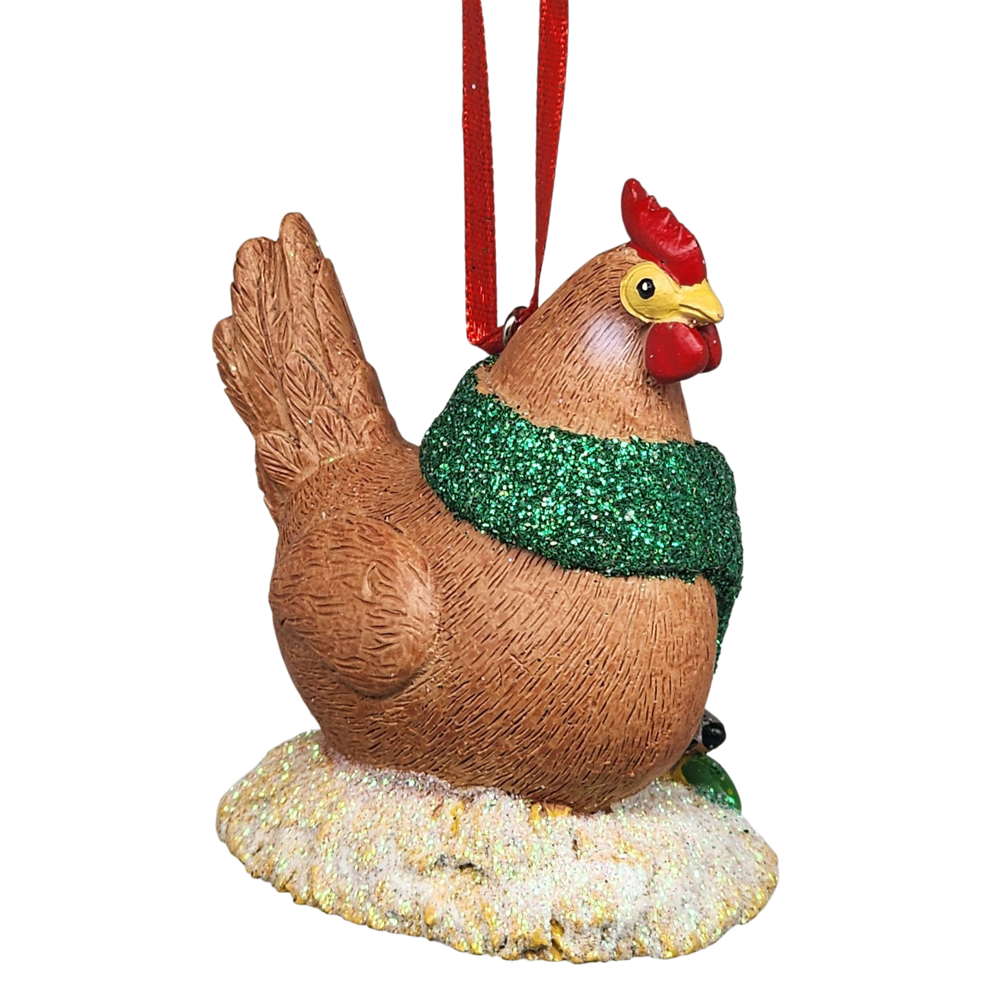 Decorative rooster ornament with a green sweater on a white background