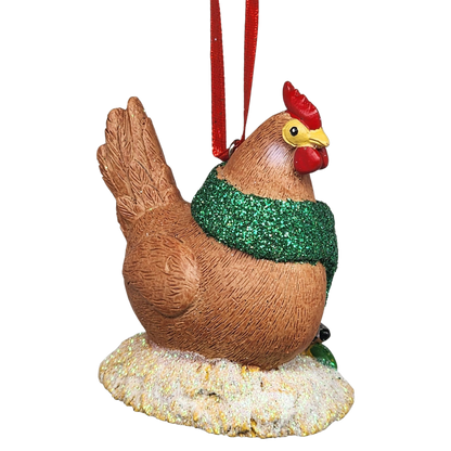 Decorative rooster ornament with a green sweater on a white background
