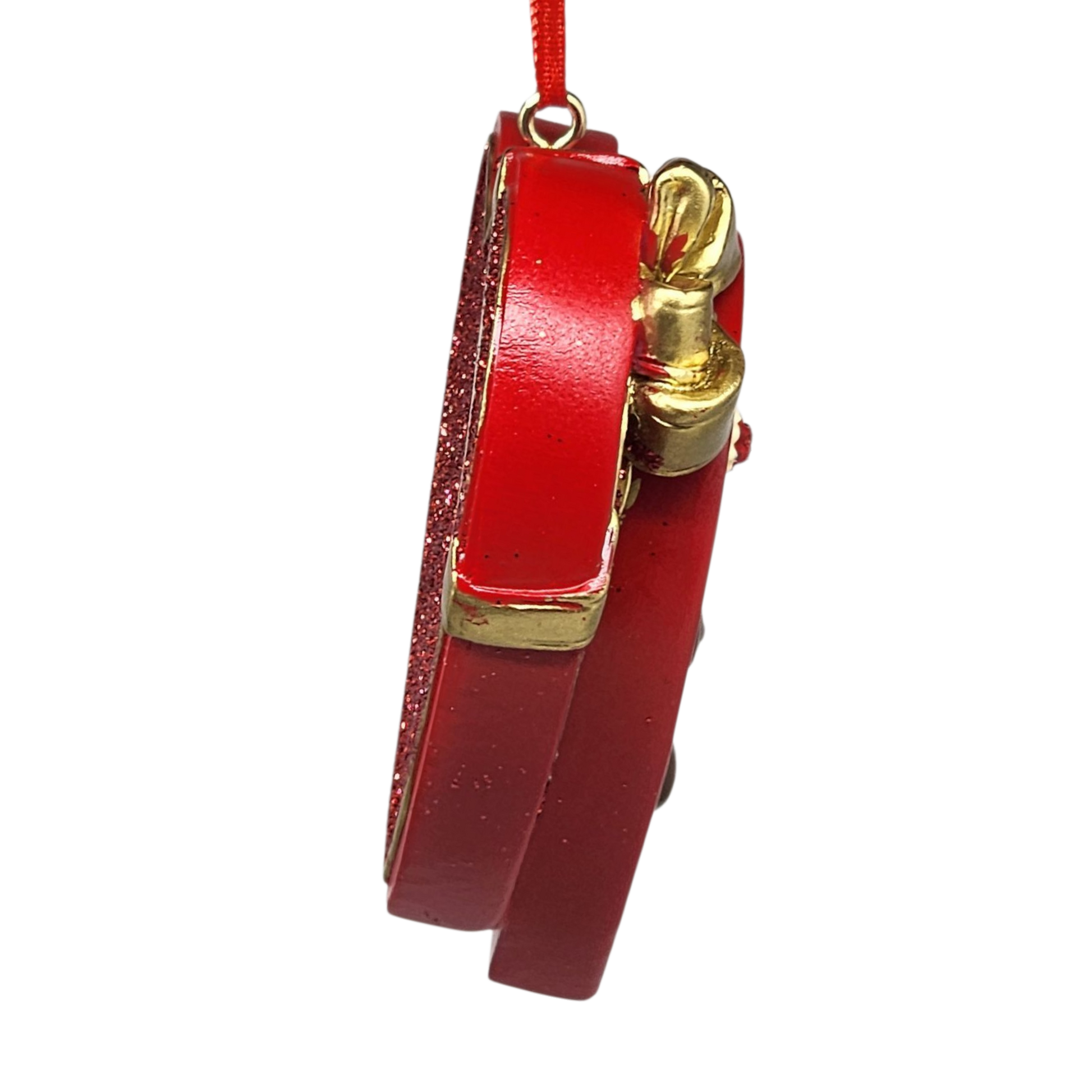 Red and gold phone-shaped ornament on a white background
