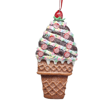 Decorative ice cream cone ornament with colorful sprinkles on a white background